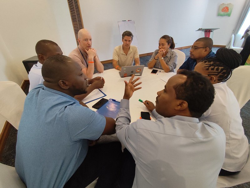 Participants engage in collaborative group discussions during the AABS Annual Planning and Partner Meeting in Mombasa, Kenya.