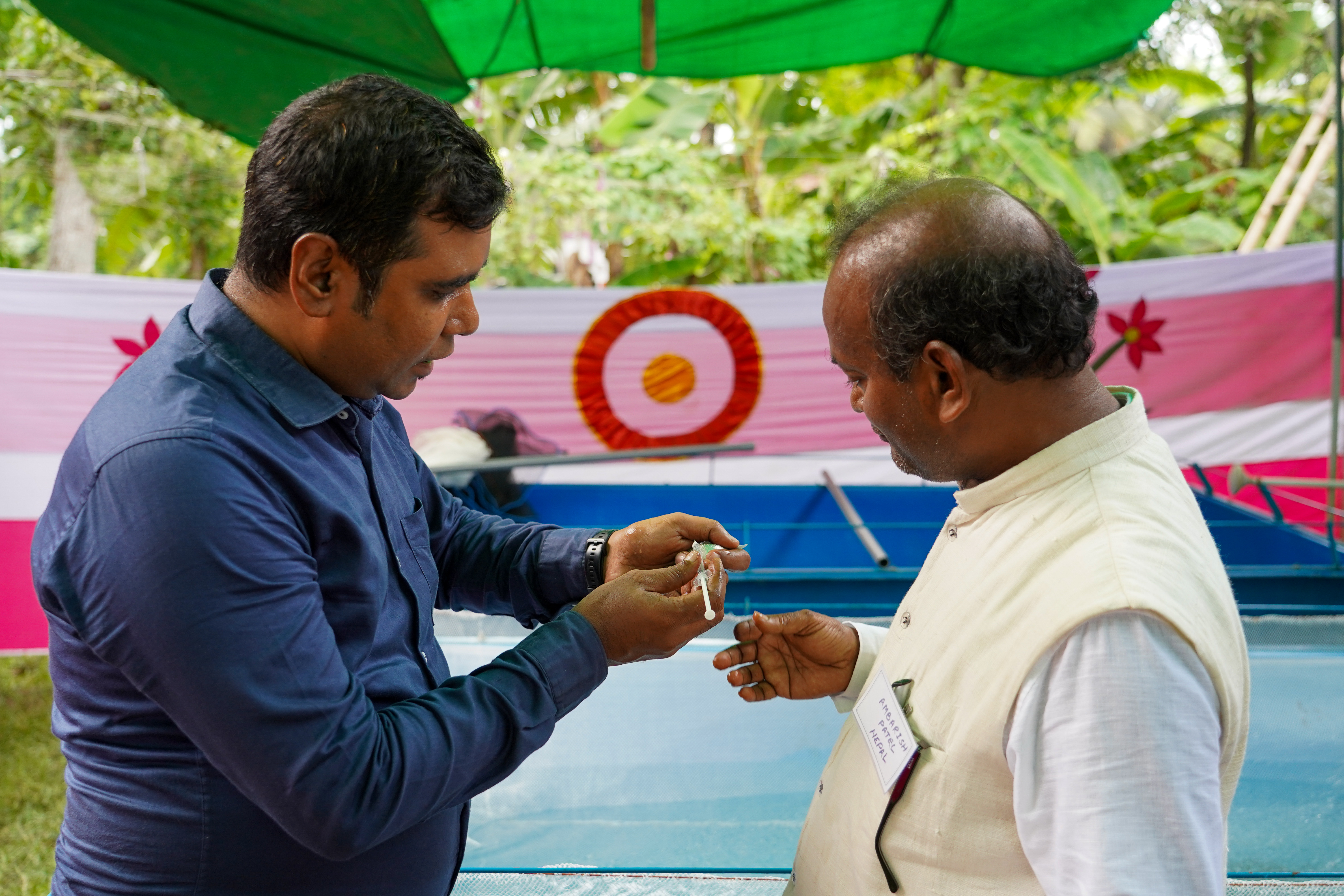 Putting Protocols into Practice — Ambarish Patel Patanawar show hormone injections for Small Indigenous Fish Species. Photo:Harun Or Rashid/WorldFish
